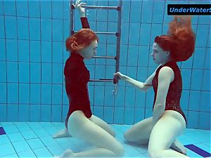 two sizzling teens underwater