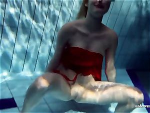 red-hot platinum-blonde Lucie French nubile in the pool